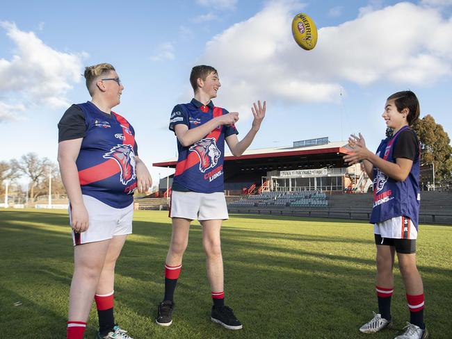 Sam, Josh and Sebastian handball the footy around. Picture: Ellen Smith