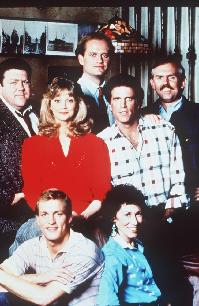 Harrelson (bottom left) with the cast of Cheers.