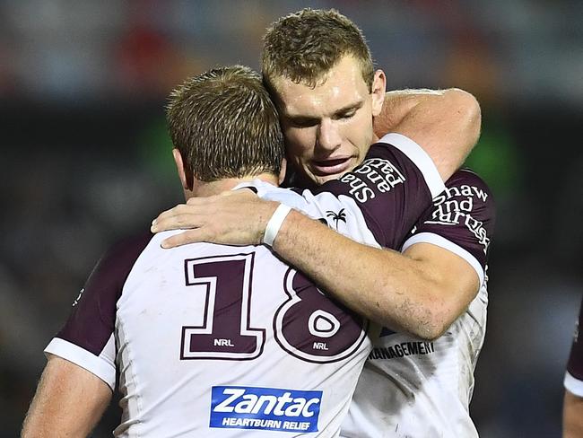 TOWNSVILLE, AUSTRALIA - JUNE 08: Jake Trbojevic  and Tom Trbojevic of the Sea Eagles celebrate after winning  the round 13 NRL match between the North Queensland Cowboys and the Manly Sea Eagles at 1300SMILES Stadium on June 08, 2019 in Townsville, Australia. (Photo by Ian Hitchcock/Getty Images)