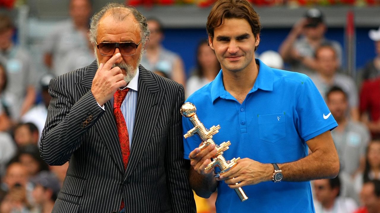 Roger Federer of Switzerland celebrates with Ion Tiriac in Madrid (Photo by AMA/Corbis via Getty Images)