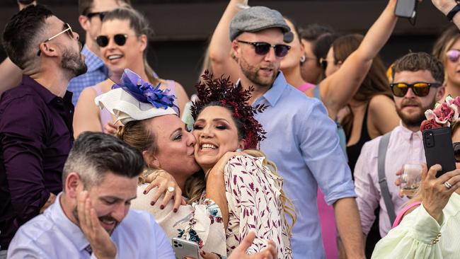 Crowds at the Melbourne Cup broke out in dance as the cup finished - for some the first time they have partied since the pandemic was declared. Picture: Jason Edwards