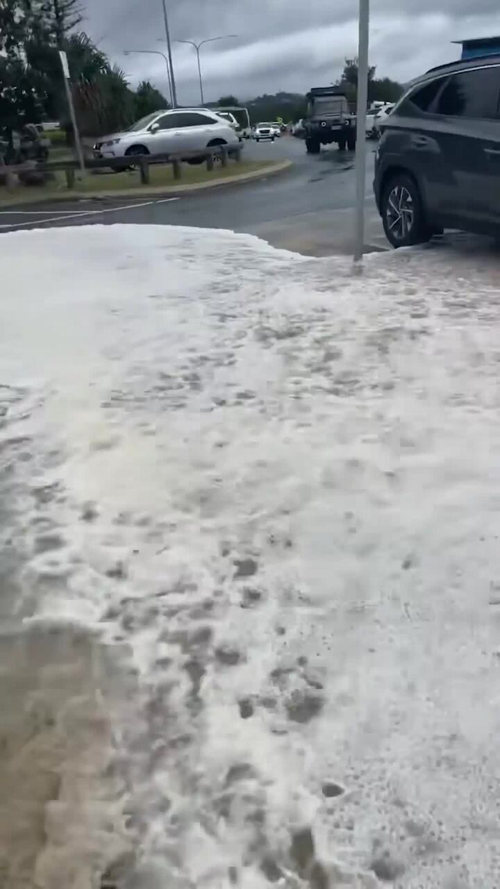 Ocean flows into Currumbin carpark as Alfred wreaks havoc