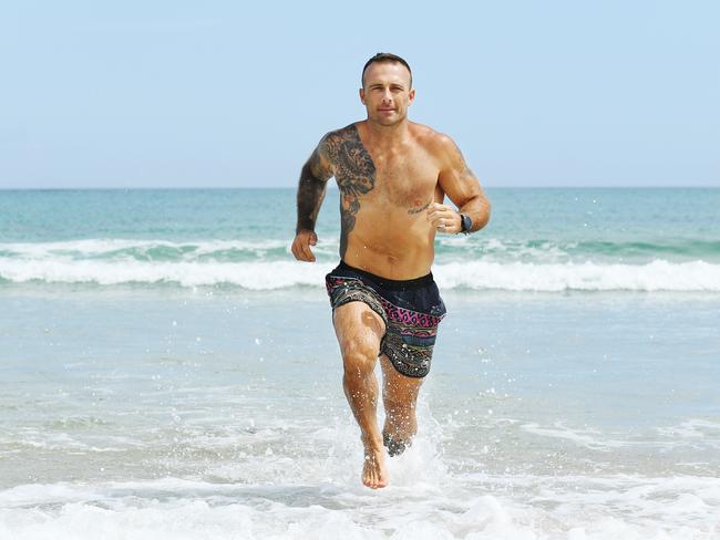 Steve Commando Willis trains on the beach at Byron Bay. Picture: Elise Derwin