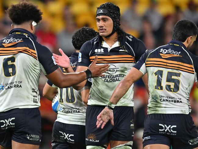 The Brumbies’ Rob Valetini is congratulated by team mates after scoring a try in a big win over the Queensland Reds. Picture: Albert Perez/Getty Images