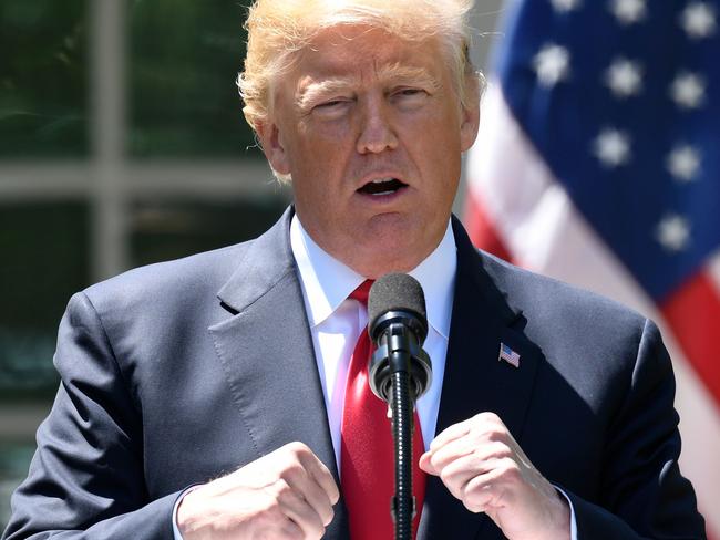 US President Donald Trump speaks during a joint press conference with Nigerian President Muhammadu Buhari in the Rose Garden of the White House on April 30, 2018, in Washington, DC. / AFP PHOTO / SAUL LOEB