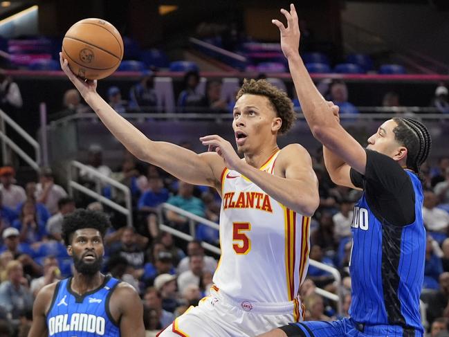 Daniels goes for a shot against Orlando Magic’s Anthony Black during an NBA play-in tournament game on April 15, 2025, in Orlando. Picture: John Raoux