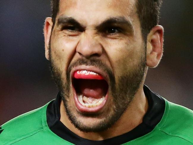 SYDNEY, AUSTRALIA - SEPTEMBER 26: (EDITORS NOTE: Retransmission with alternate crop.) Greg Inglis of the Rabbitohs celebrates scoring his first try during the First Preliminary Final match between the South Sydney Rabbitohs and the Sydney Roosters at ANZ Stadium on September 26, 2014 in Sydney, Australia. (Photo by Matt King/Getty Images)