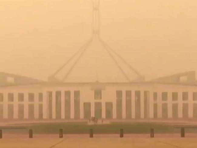 Thick bushfire smoke seen over Parliament house in Canberra Picture: 7News