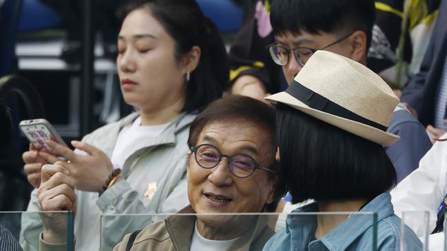 Jackie chan watches the women’s final. Picture: Michael Klein