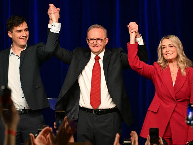 Prime Minister Anthony Albanese celebrates victory with fiancee Jodie Haydon and son Nathan Albanese. Picture: Saeed Khan/AFP