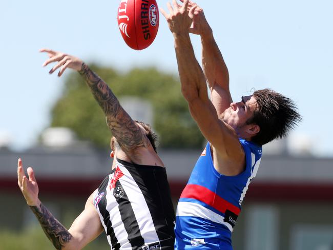 Easton Wood flies for a mark against the Magpies. Picture: Michael Klein