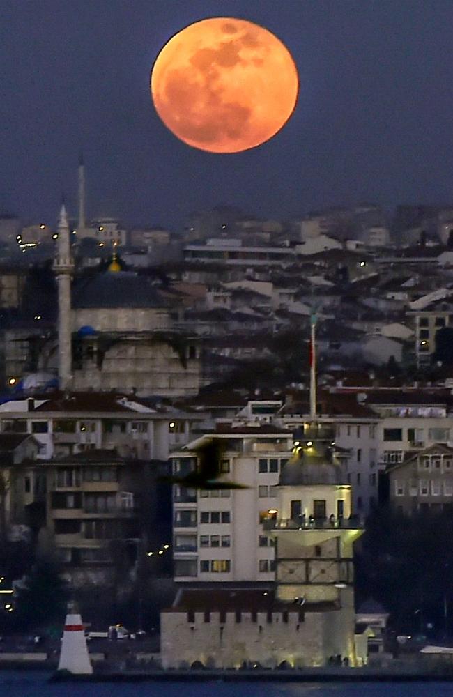 The beautiful moon up in the sky above the Bosphorus straits in Istanbul. Picture: AFP