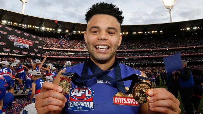 Jason Johannisen with his Norm Smith and premiership medals. Picture: Getty Images