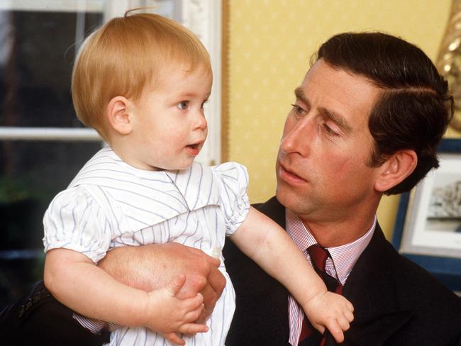 Prince Charles with Prince Harry, pictured at Kensington Palace in 1985. Picture: Getty Images