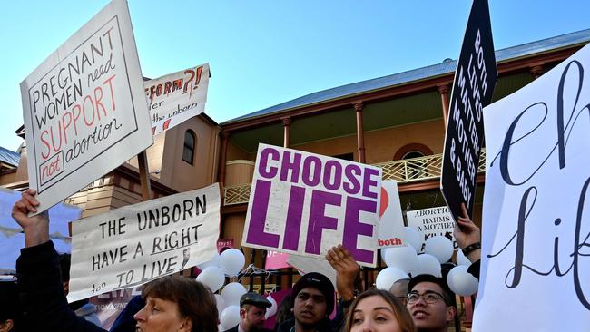 Pro-life and pro-choice advocates have been protesting outside the New South Wales parliament this week over the Reproductive Health Care Reform Bill. Picture: Saeed Khan/AFP