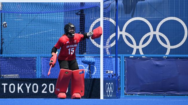 New Zealand's goalkeeper Grace O'Hanlon shouts during the women's pool B match of the Tokyo 2020 Olympic Games field hockey competition against Argentina, at the Oi Hockey Stadium in Tokyo on July 25, 2021. (Photo by Ina Fassbender / AFP)