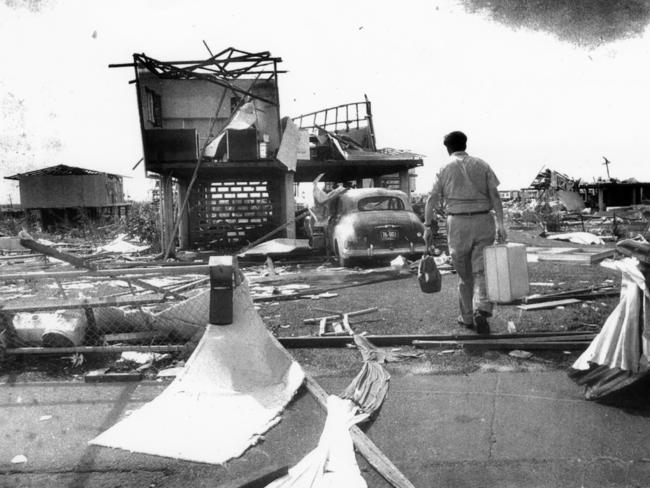 Tropical Cyclone Tracy, Darwin, Northern Territory, Dec 1974. Lyn Cox returns from leave in Perth to find his 9 Kilfoyle Crescent, Nakara home wrecked beyond imagination. (Copyright Herald Sun, pic by staff photographer Bruce Howard)