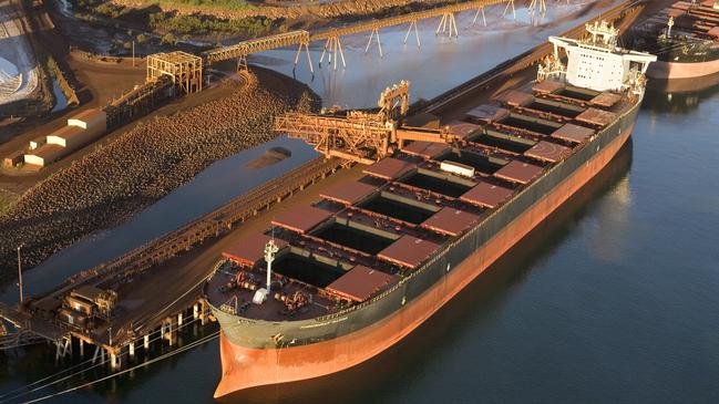 An iron ore carrier loading, ready for the voyage to China.