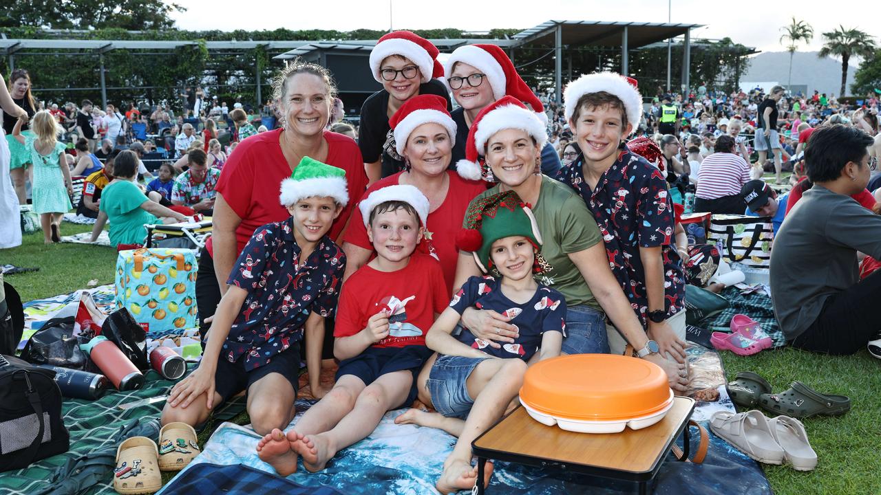 Christine Oates, Henley Miller, 9, Franklin Gobus, 7, Nicholas Gobus, 12, Nicole Gobus, Madden Miller, 7, Victoria Miller, Elliot Gobus, 10, and Hudson Miller, 11, at the Carols in the Park, held at Munro Martin Parklands. Picture: Brendan Radke