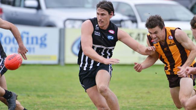 Former Western Bulldogs captain Ryan Griffen returns to his hometown to play for boyhood club Goolwa/Port Elliot Magpies against Langhorne Creek at Goolwa Oval in his first match since retiring from the AFL, Saturday, July 27, 2019. Ryan (centre) chases the ball. (Pic: AAP/Brenton Edwards)