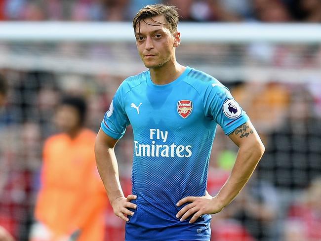 LIVERPOOL, ENGLAND - AUGUST 27:  Mesut Ozil of Arsenal is dejected after Liverpool's fourth goal during the Premier League match between Liverpool and Arsenal at Anfield on August 27, 2017 in Liverpool, England.  (Photo by Michael Regan/Getty Images)