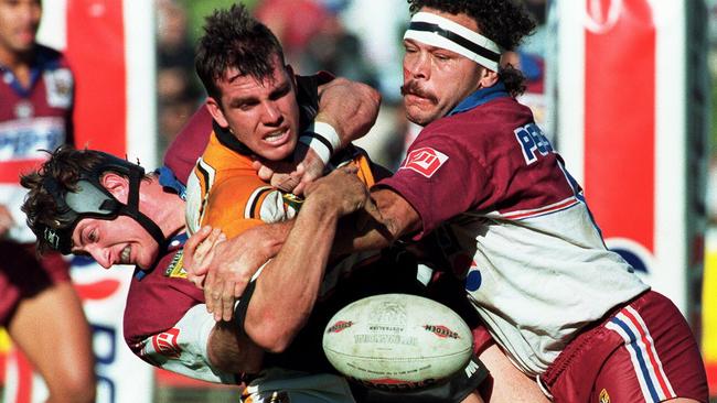 Menzies &amp; Lyons take care of Darren Senter in 1996.