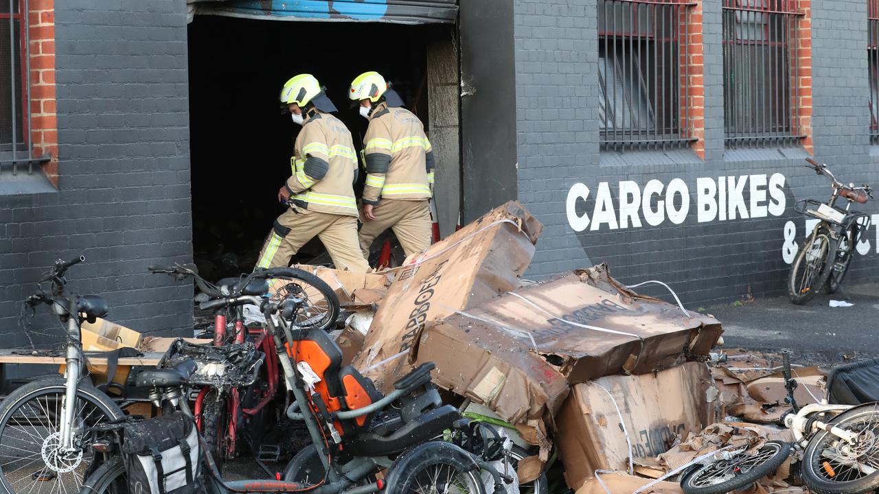 Man set on fire in ram raid on Lygon St bike shop