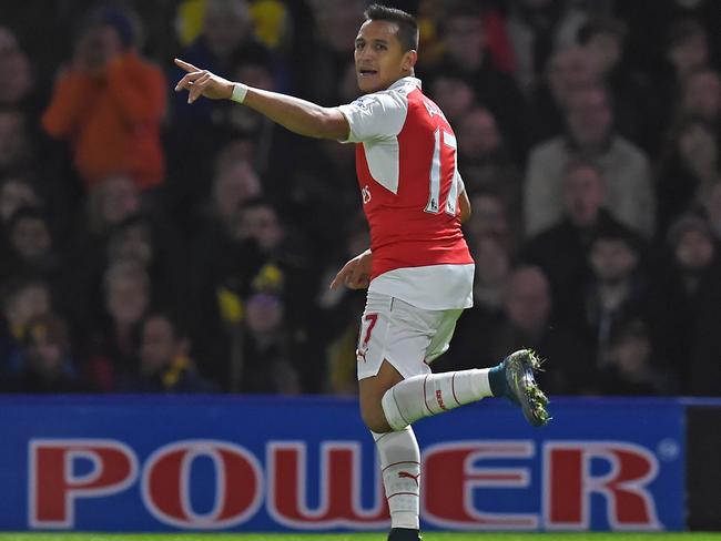 Arsenal's Alexis Sanchez celebrates scoring the opening goal against Watford.