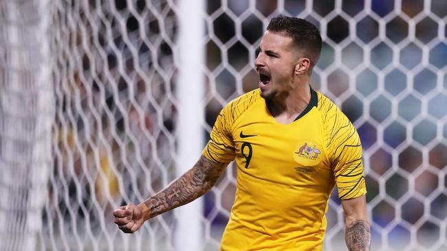 Jamie Maclaren celebrates scoring his hat-trick for the Socceroos. Picture: Getty Images