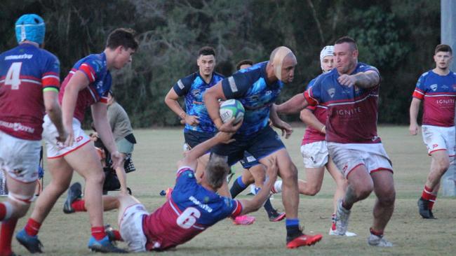 (GCDRU) Former Brumbies winger Lausii Taliauli scored a double for the Helensvale Hogs against Bond Pirates on May 15, 2021. Picture: Verna Kaaka.