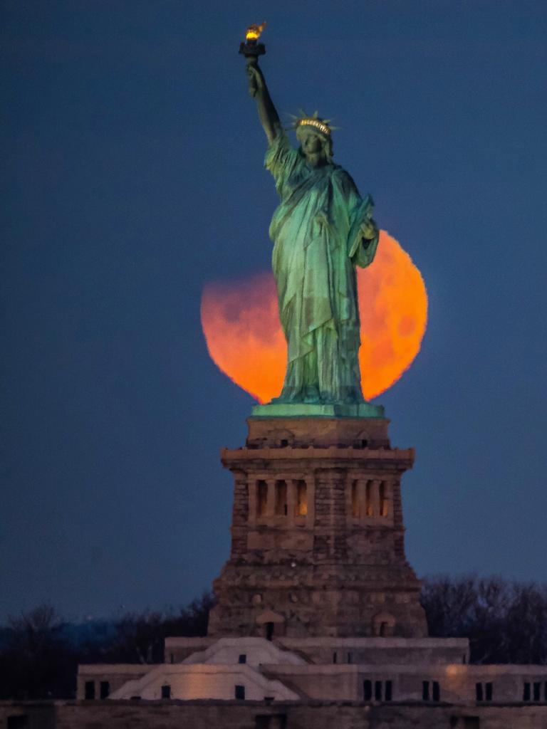 The Super Blue Blood Moon capture with the Statue of Liberty in the foreground. Picture: Khordi Photography/ Supplied