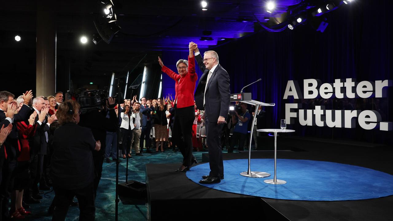 Shadow Foreign Affairs Minister Penny Wong and Anthony Albanese receive a standing ovation during the election campaign launch. Picture: Paul Kane/Getty Images