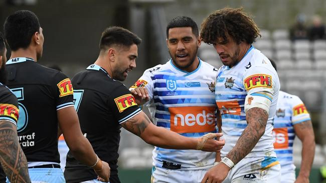 Shaun Johnson shows Kevin Proctor the marks on his arm. Picture: NRL Photos