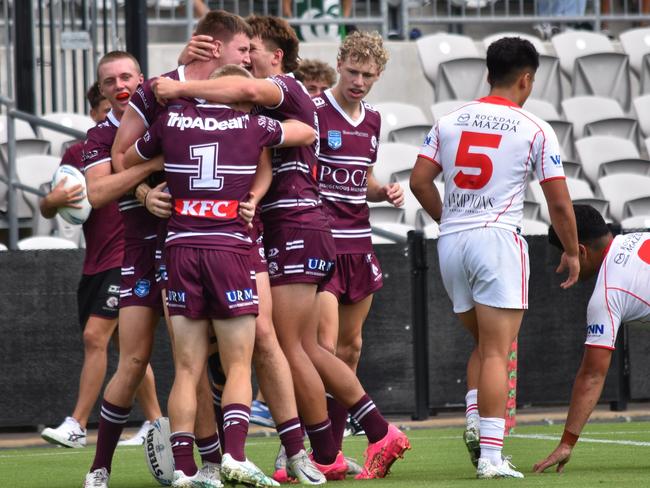 Manly celebrates a try to Kaleb Serafin. Picture: Sean Teuma