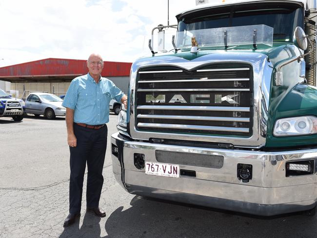 Graham Richers poses with a truck after being named Fraser Coast Citizen of the Year in 2018.