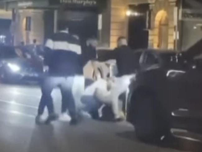 Footage shows Ruka Carlson being attacked by a group of men in Chapel St. The father was allegedly stabbed to death. Picture: 7News