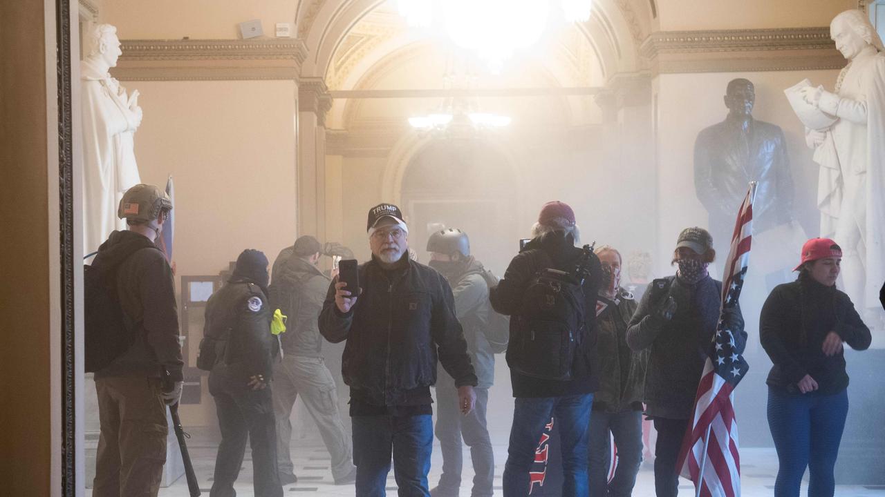 A woman was shot dead in today’s chaos. Picture: Saul Loeb/AFP