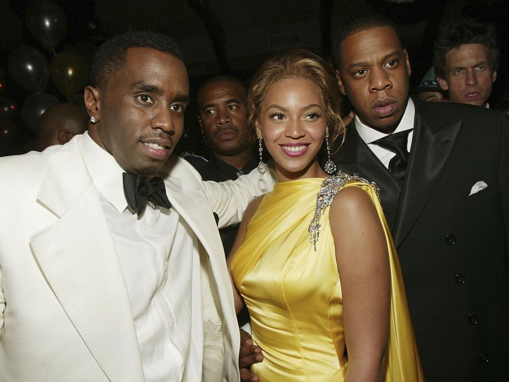 The couple with Diddy at a party at Marquee in NYC in June 2004. Picture: Evan Agostini/Getty Images