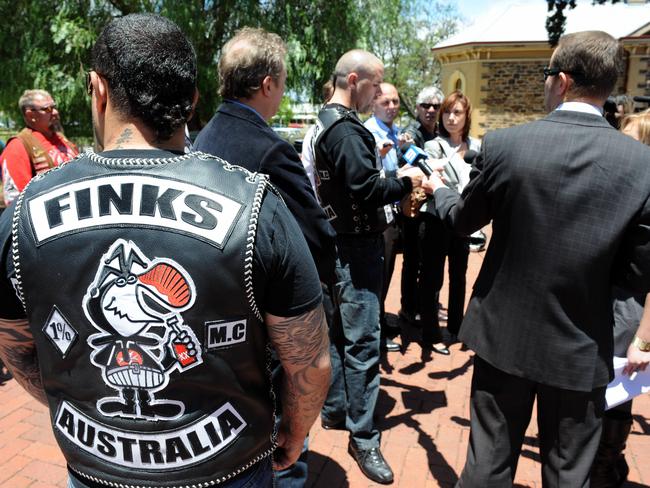 Finks member Mick MacPherson talks to media during his time in South Australia.