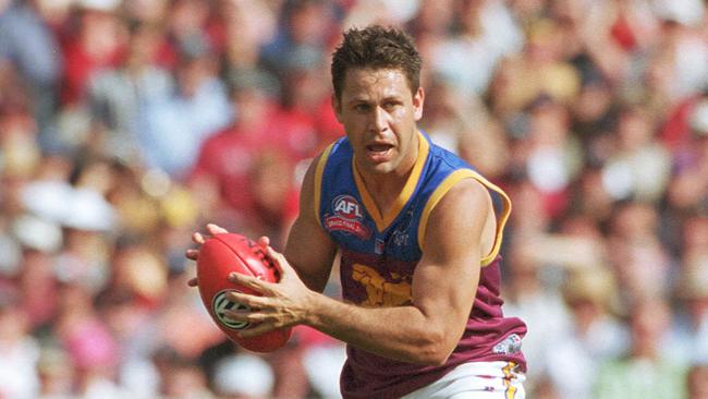 Chris Johnson on the burst for Brisbane Lions during his playing days. 