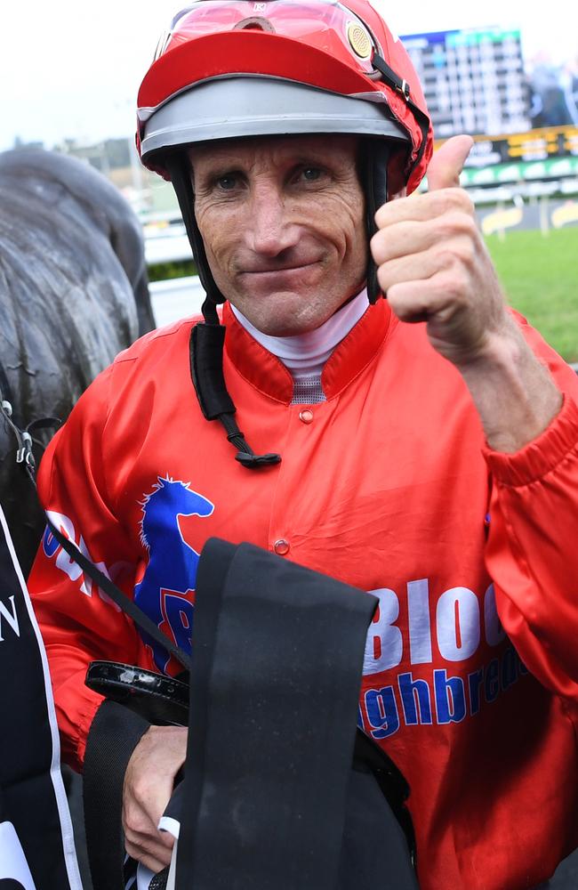 Jockey Damien Oliver gives his latest Group 1 success the thumbs up. Picture: AAP