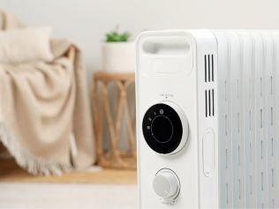 Stay cosy with one of the best types of heaters for long lasting warmth, even when you've switched it off. Picture: iStock/Liudmila Chernetska.