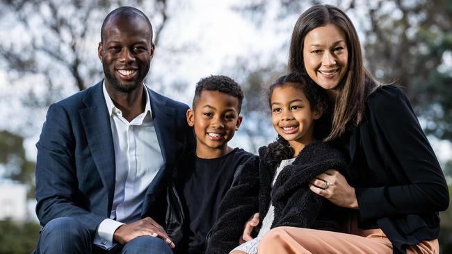 Bruce Djite with wife Amy and kids Aalia, 5 and Elijah, 7, near their eastern suburbs home. Picture: Tom Huntley