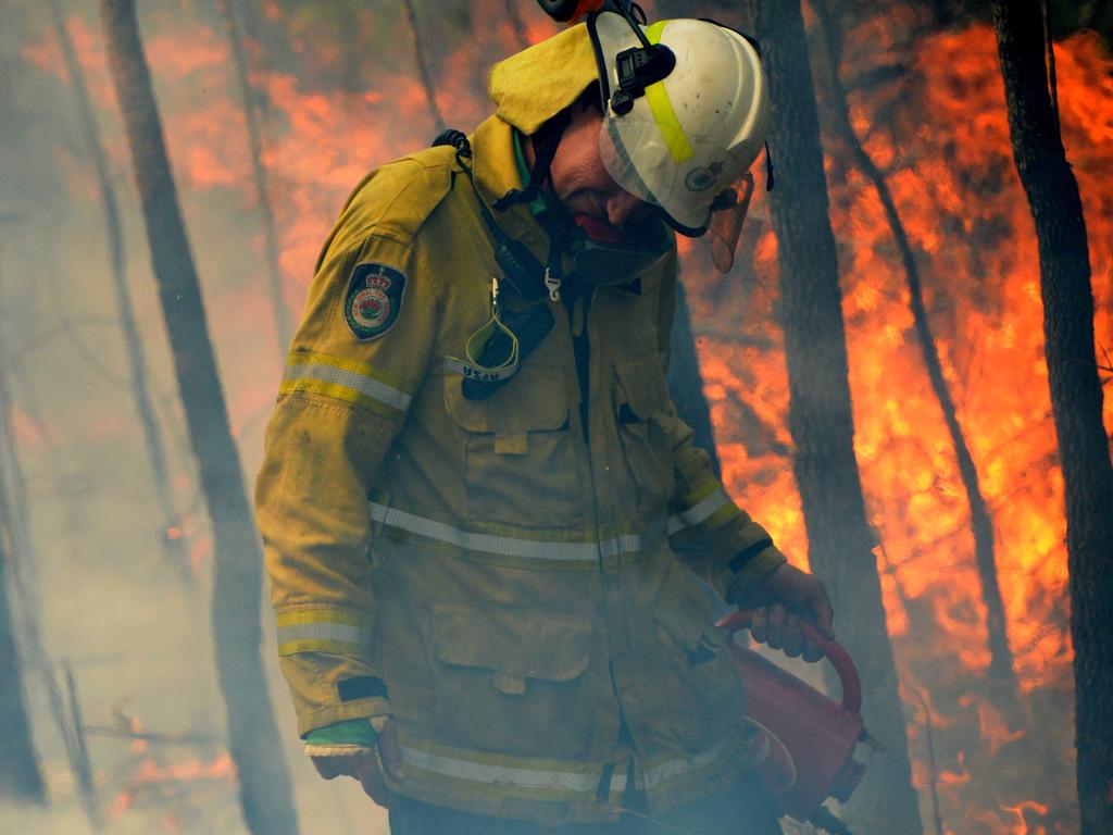 Although grass and bushfires are likely to occur over the next three months, the latest Climate Outlook suggests we will not have a repeat of Black Summer. Above: a NSW Rural Fire fighter establishes a backburn in Mangrove Mountain, December 8, 2019. Picture: AAP Image/Jeremy Piper