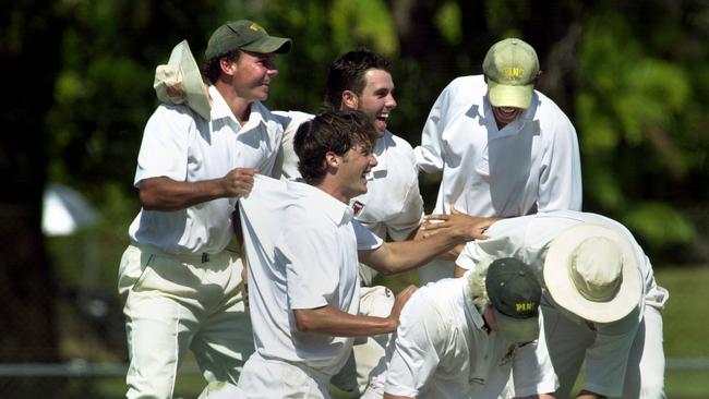 PINT celebrate a wicket against Palmerston, caught by Alan Reeves off the bowling of Rob Edis. Picture: Michael Marschall.