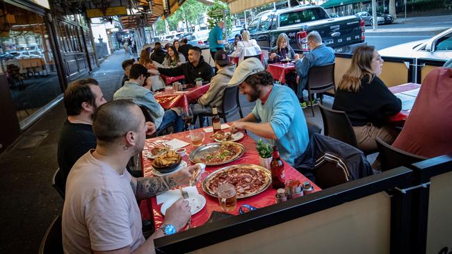 Melburnians enjoy outdoor eating again on Lygon Street in Carlton. Picture: Getty Images