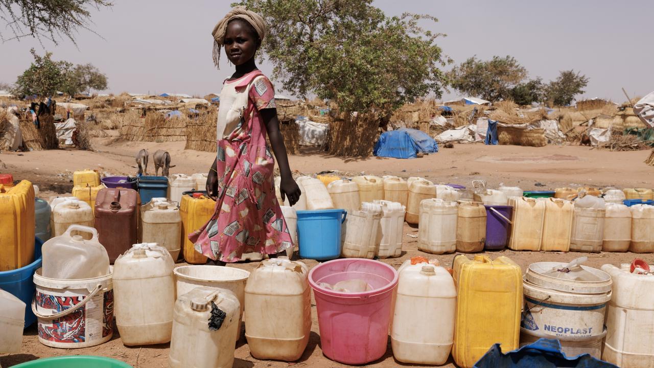 A child refugee collects water at Ourang refugee camp in Adre, Chad on April 21. Chad is now home to one of the largest and fastest-growing refugee populations in Africa. Picture: Dan Kitwood/Getty Images