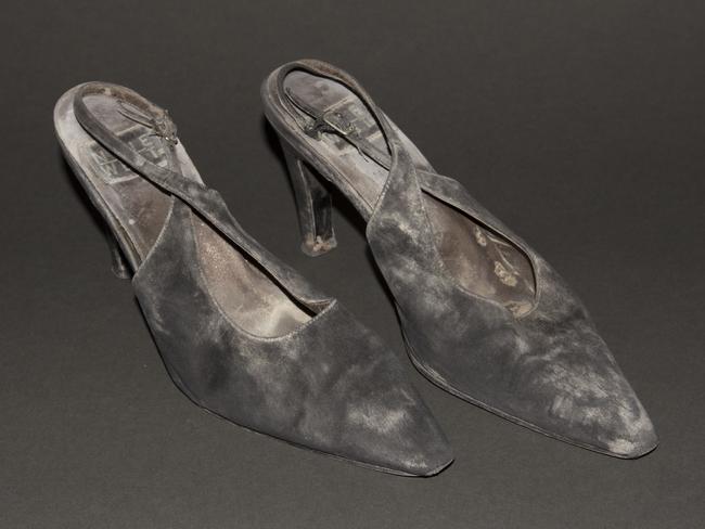 A pair of high-heel shoes worn by JoAnne “JoJo” Capestro while descending 87 floors of stairs to escape a World Trade center tower on Sept. 11, 2001. The shoes are among the clothes, wallets, helmets, and other personal effects donated to the museum by survivors and those who worked at the site in the attacks’ aftermath. Picture: National September Memorial and Museum