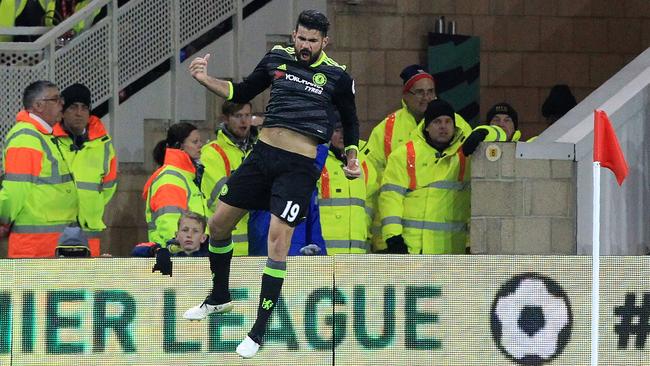 Chelsea's Brazilian-born Spanish striker Diego Costa (C) celebrates scoring.