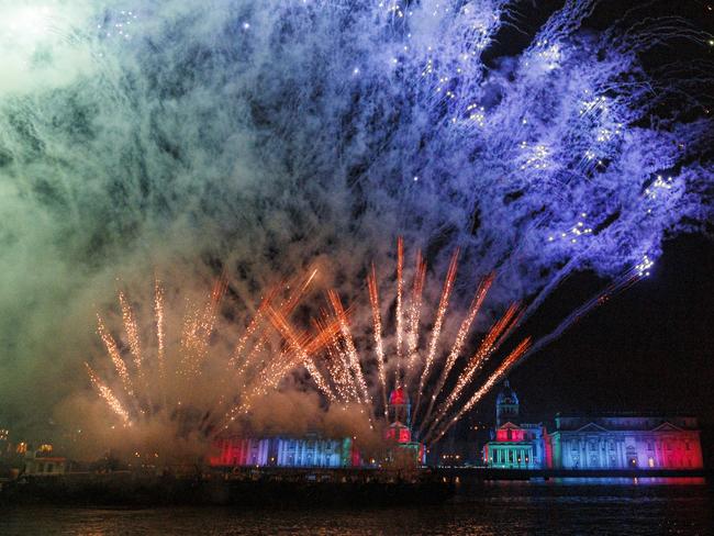 Fireworks and a drone light show are seen over the Old Royal Naval College in Greenwich to bring in the New Year in London, England. Picture: Getty